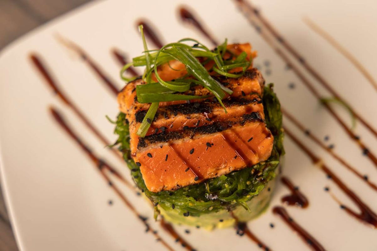 a close up of a plate of food with a fork