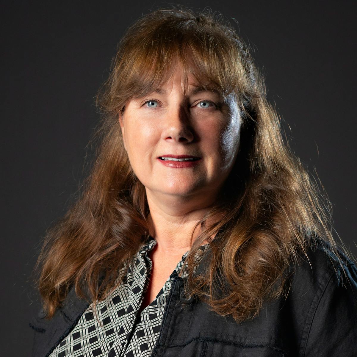 a person smiling for the camera