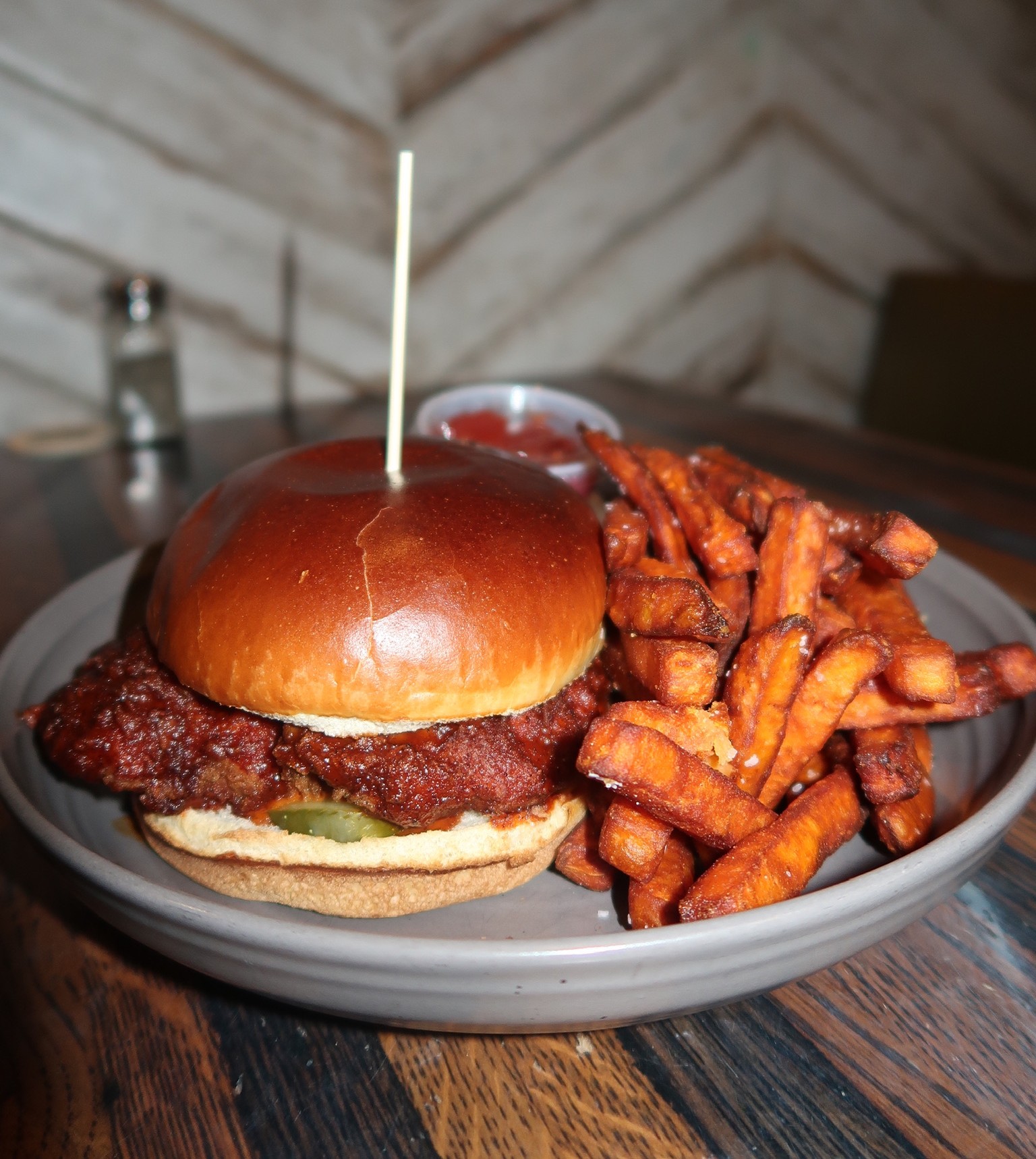 a burger and fries on a plate