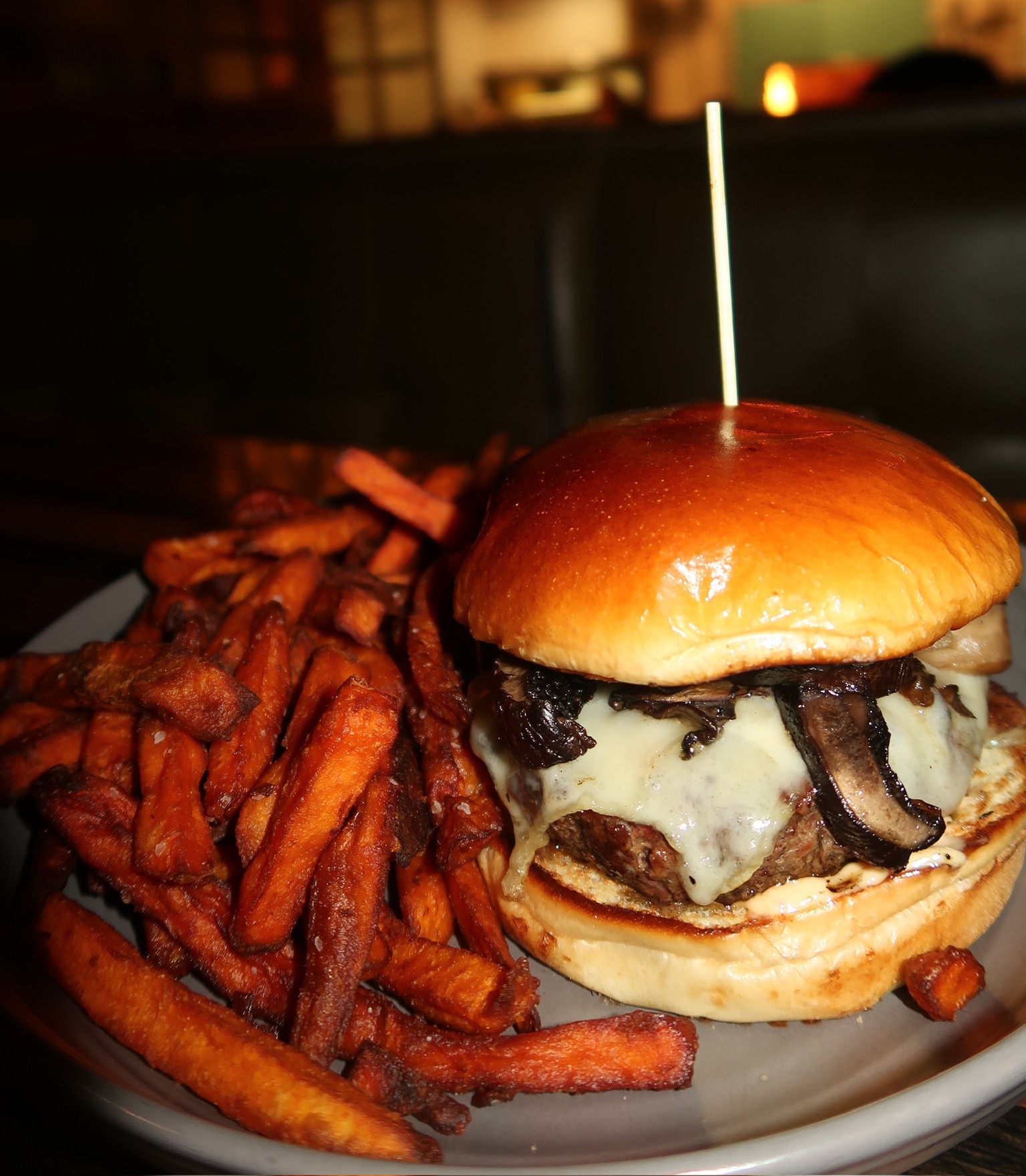 a burger and fries on a plate