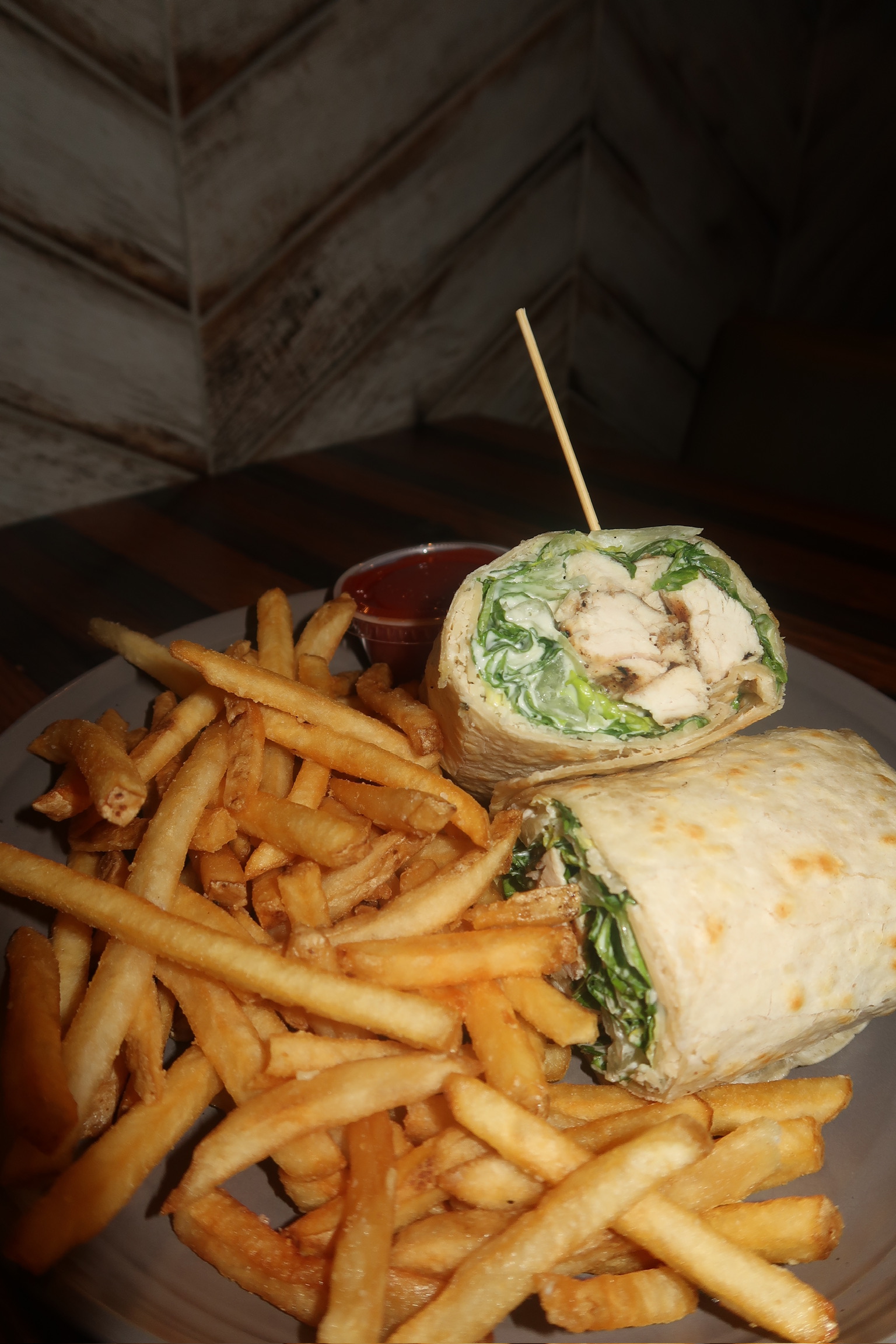 a plate of food with a sandwich and fries