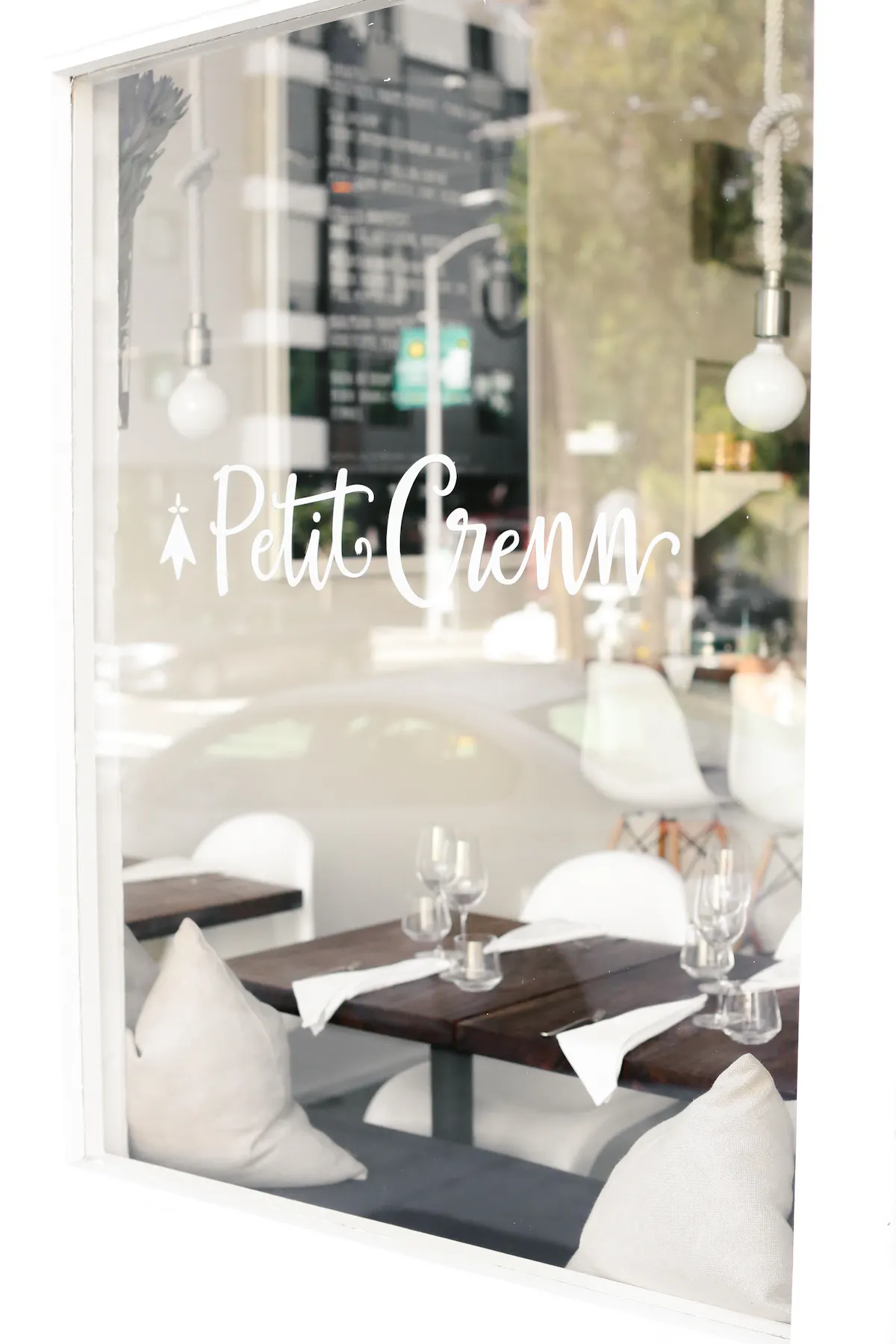 a room filled with furniture and a large window