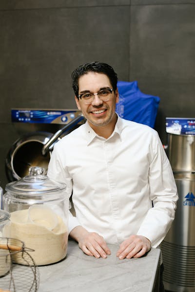 a man holding a cup