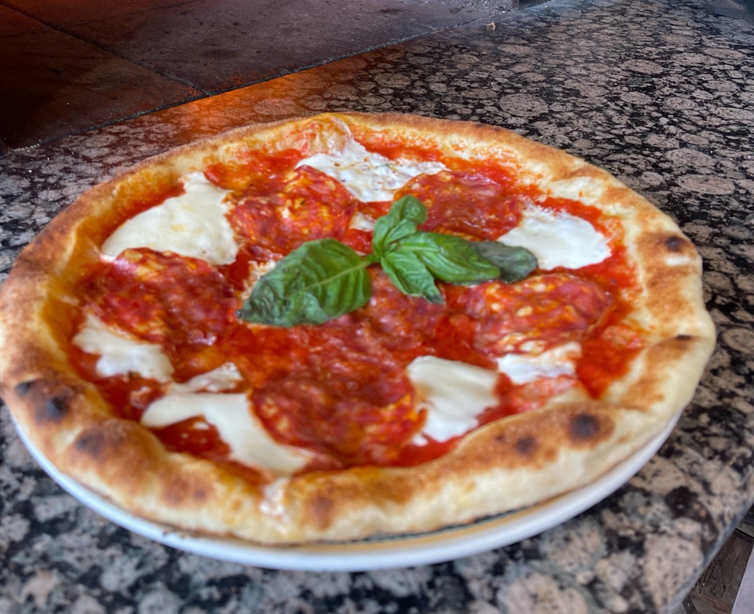 a pizza sitting on top of a table