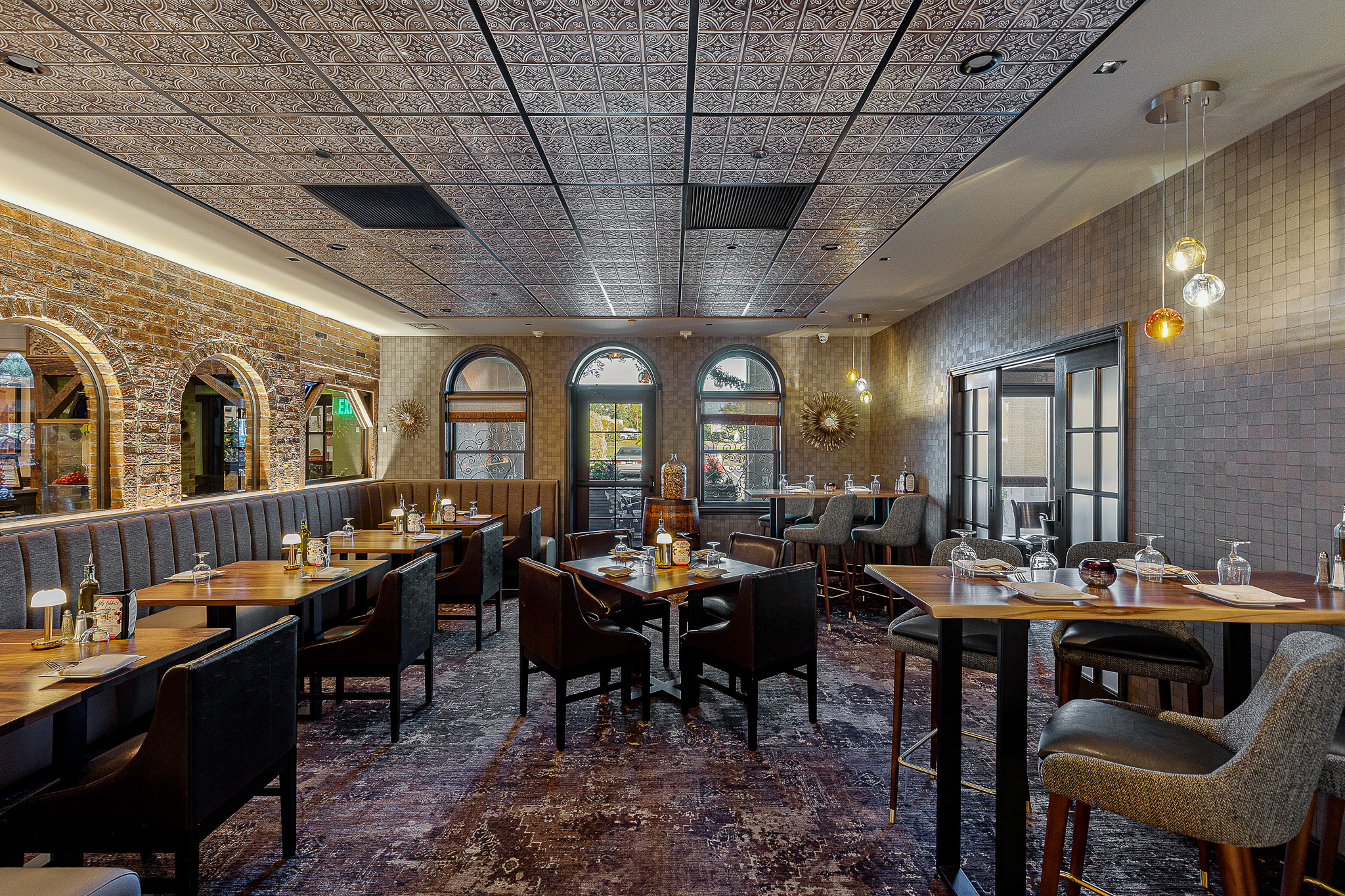 a group of people sitting at a table in a room