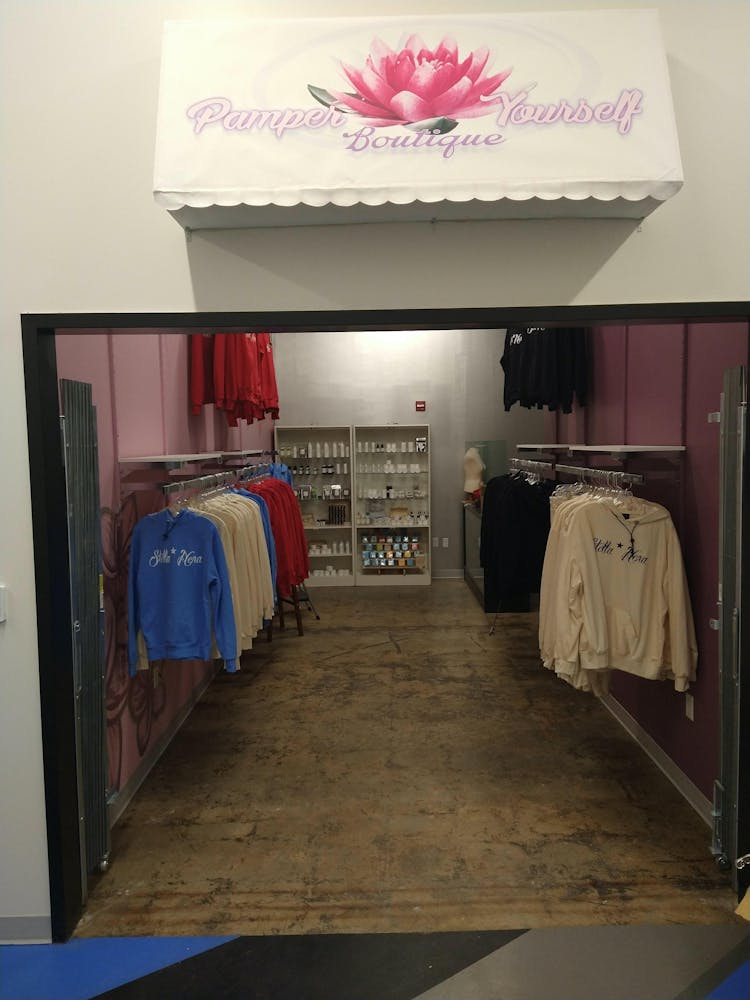 a large shop with sweatshirts