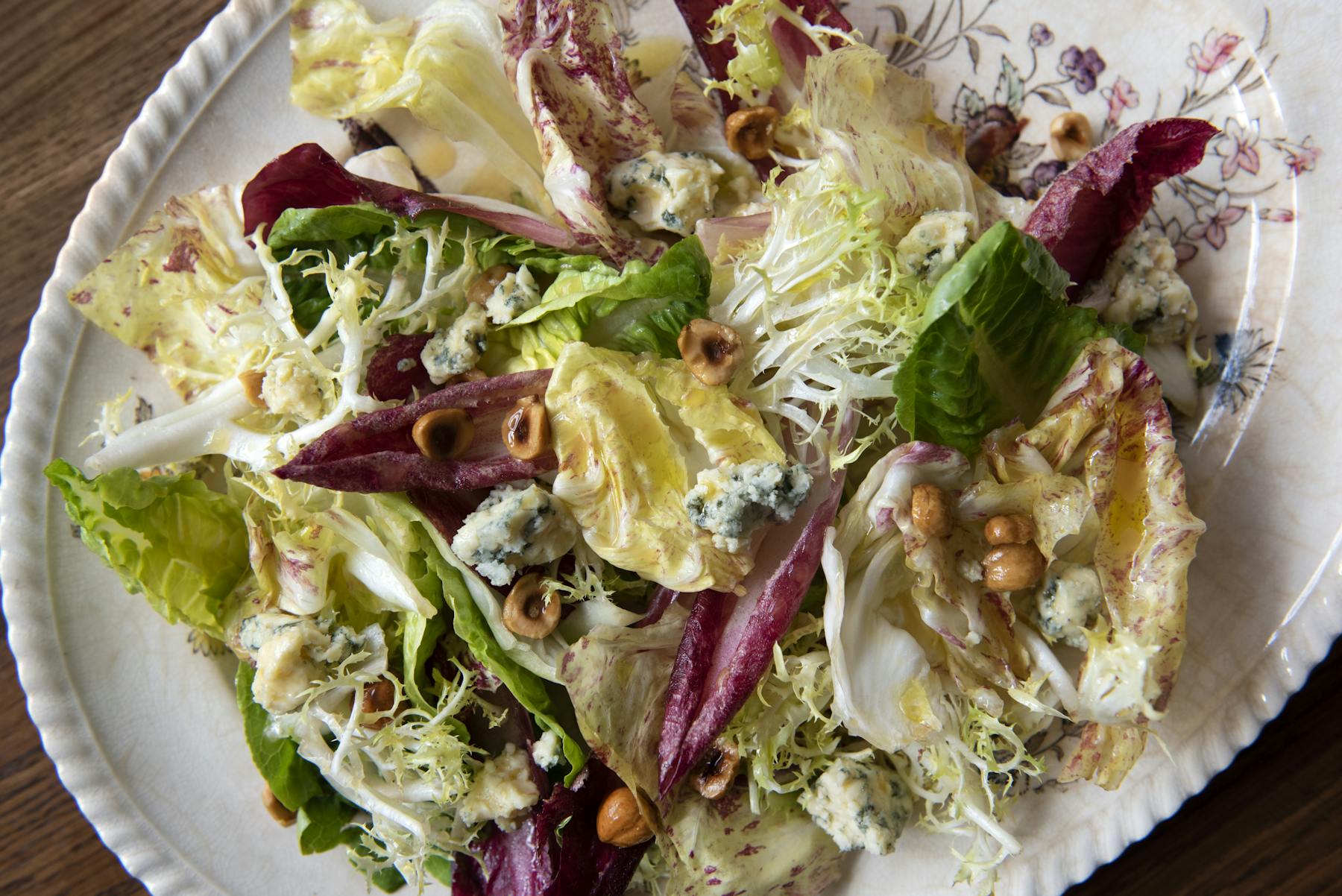 a plate of food with a sandwich and a salad