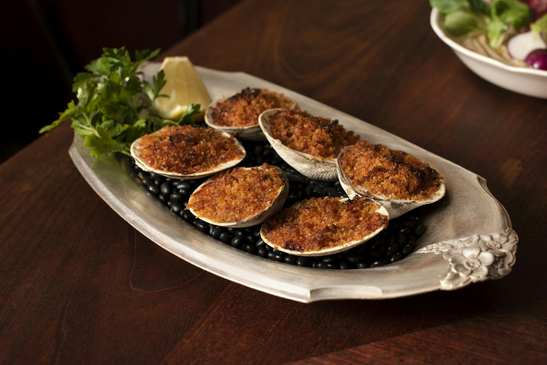 a plate of food on a wooden table