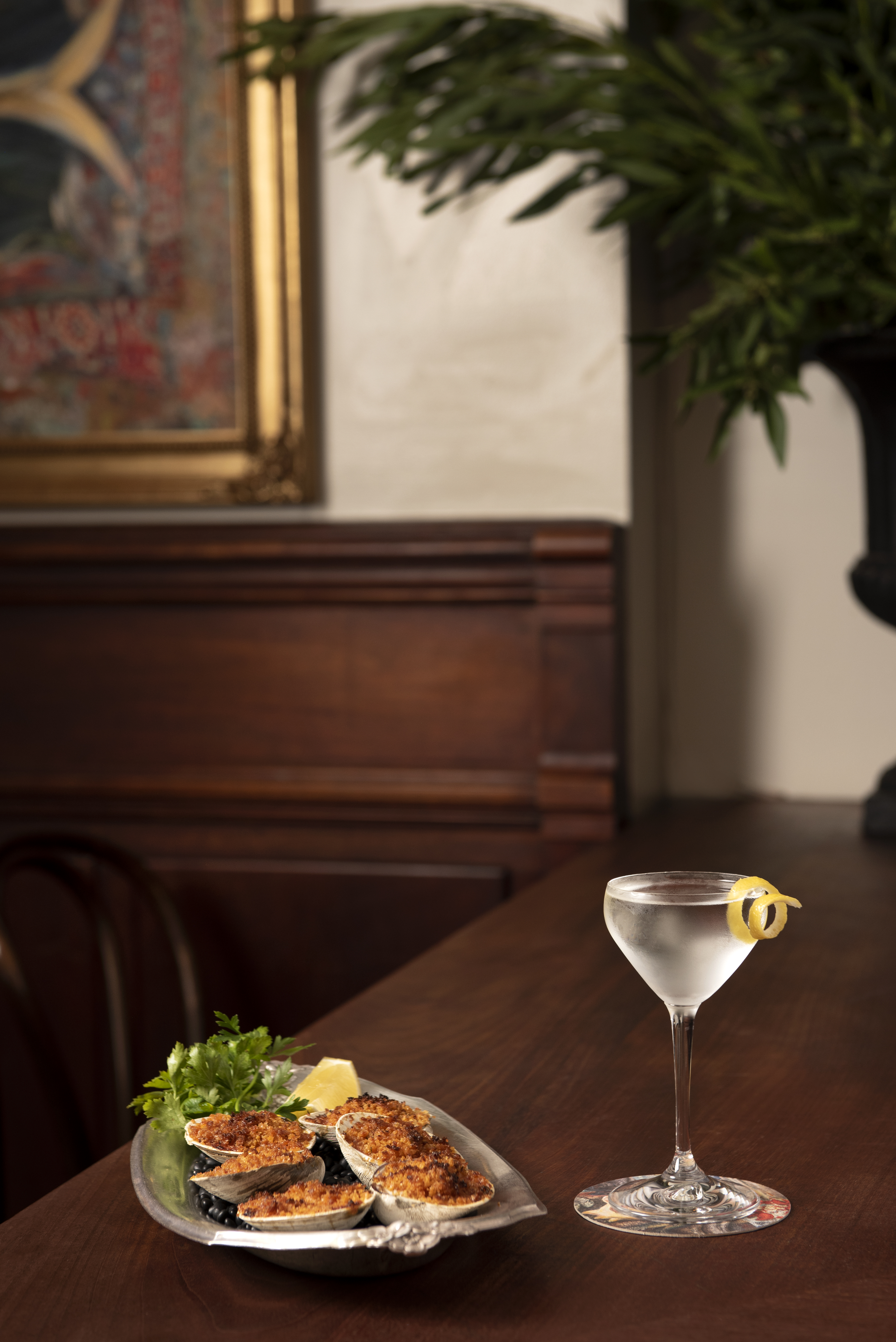 a plate of food and a glass of wine