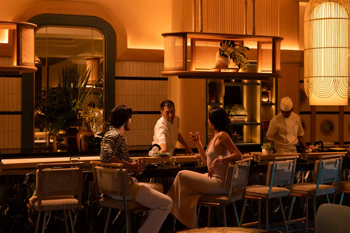 a group of people sitting at a table
