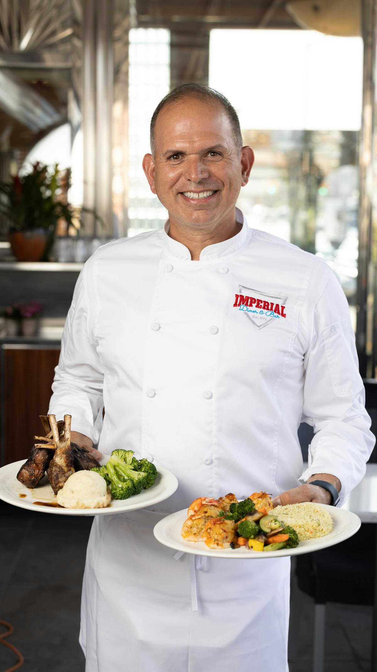 a person holding a plate of food