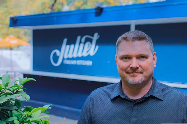 a man in a blue shirt