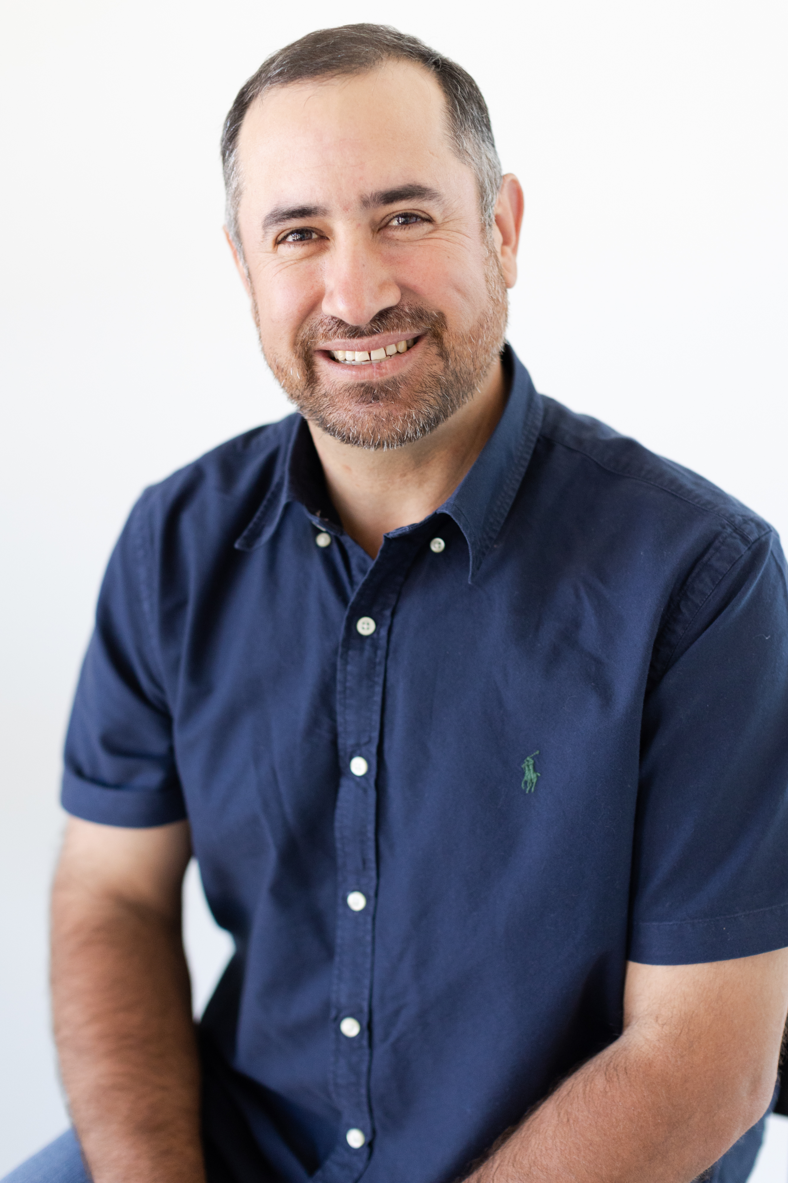 a man wearing a blue shirt