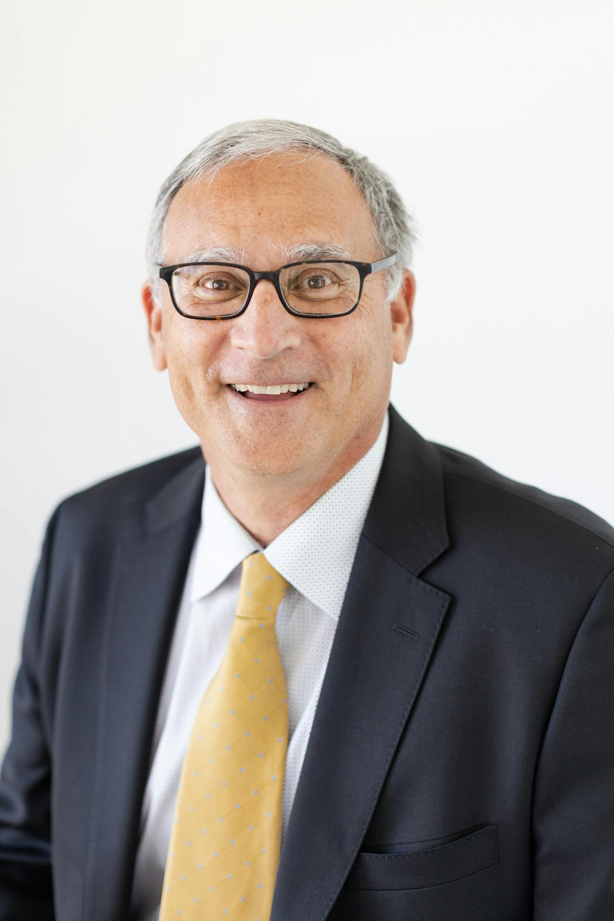 a man wearing a suit and tie