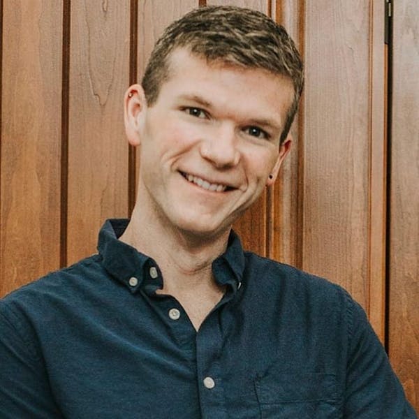 a man smiling for the camera