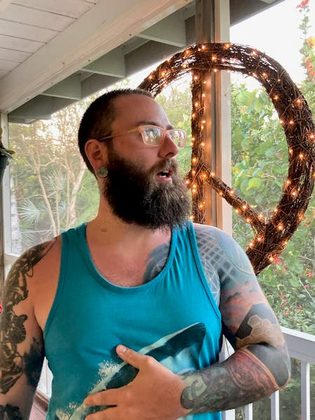a man in a blue shirt