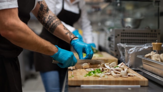 a person preparing food in a kitchen
