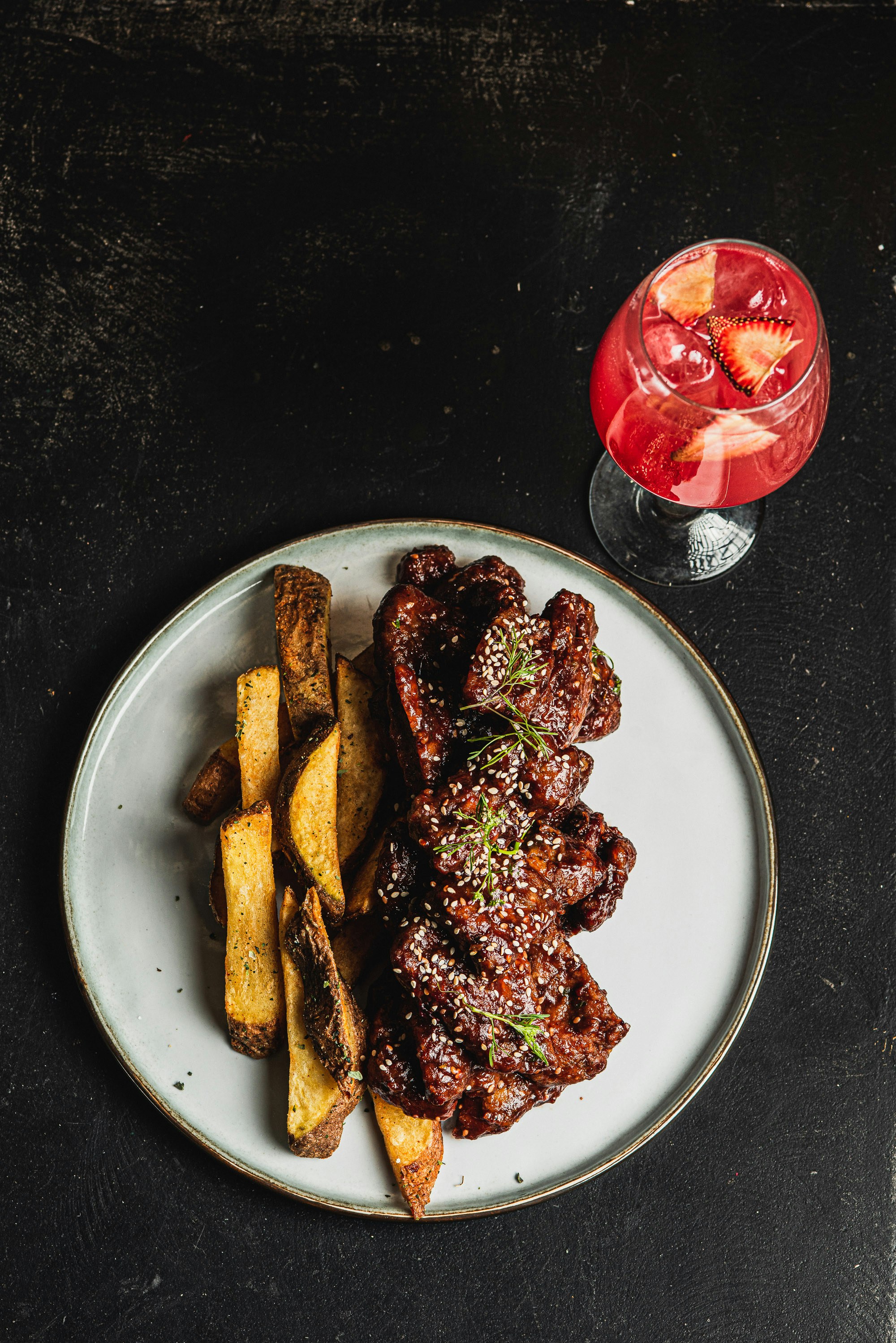 a plate of food and a drink