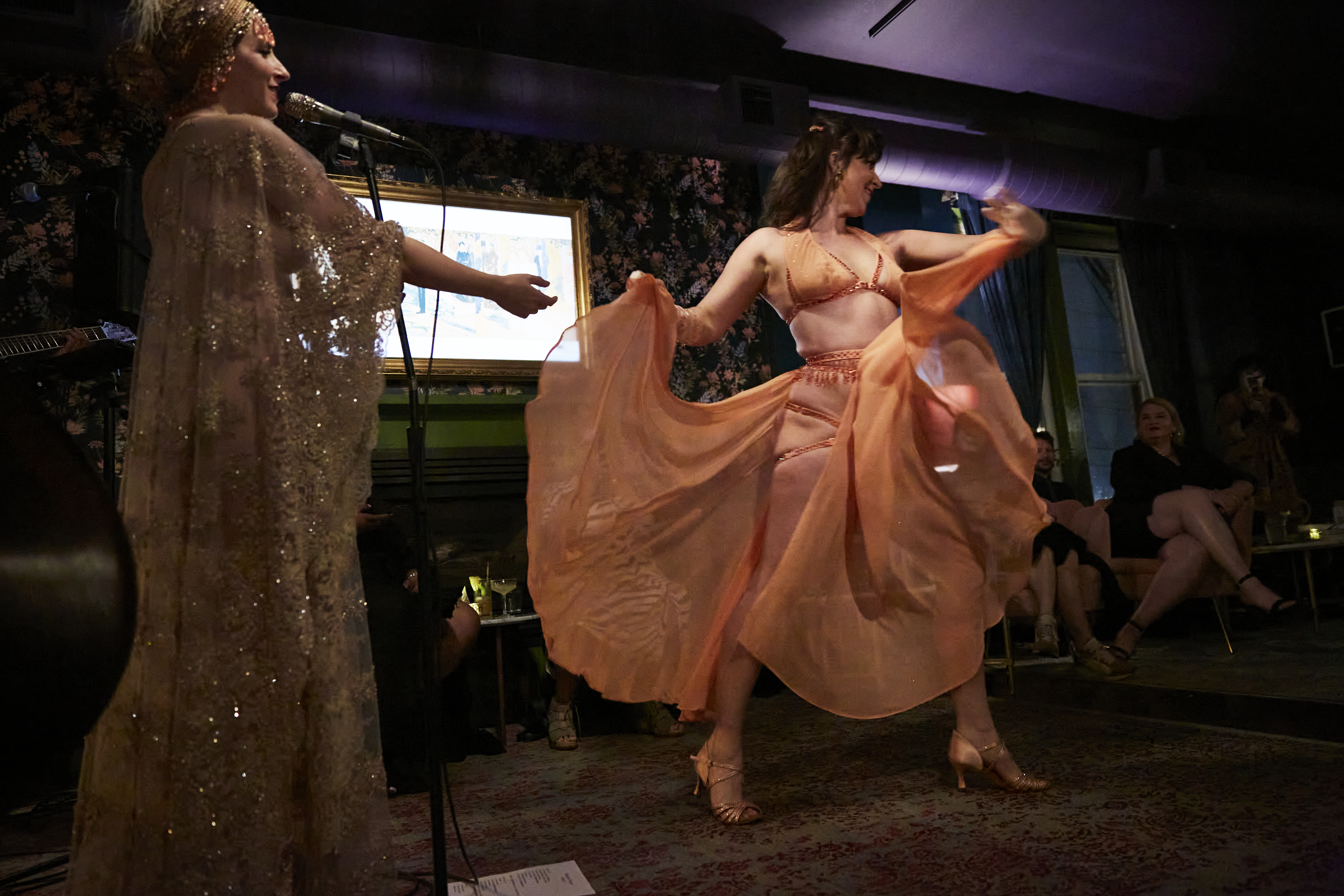 a man and a woman standing in a room