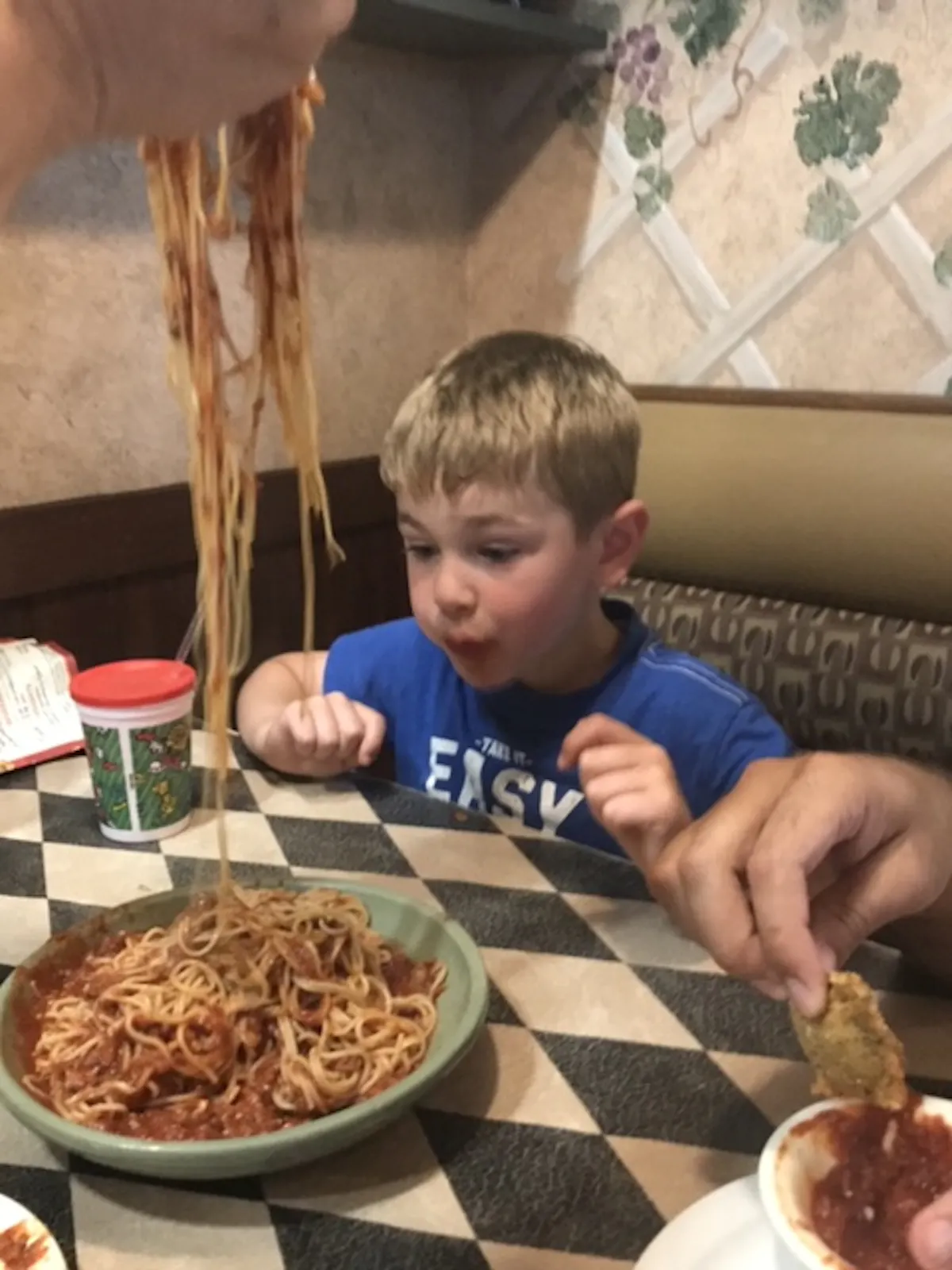 people eating spaghetti