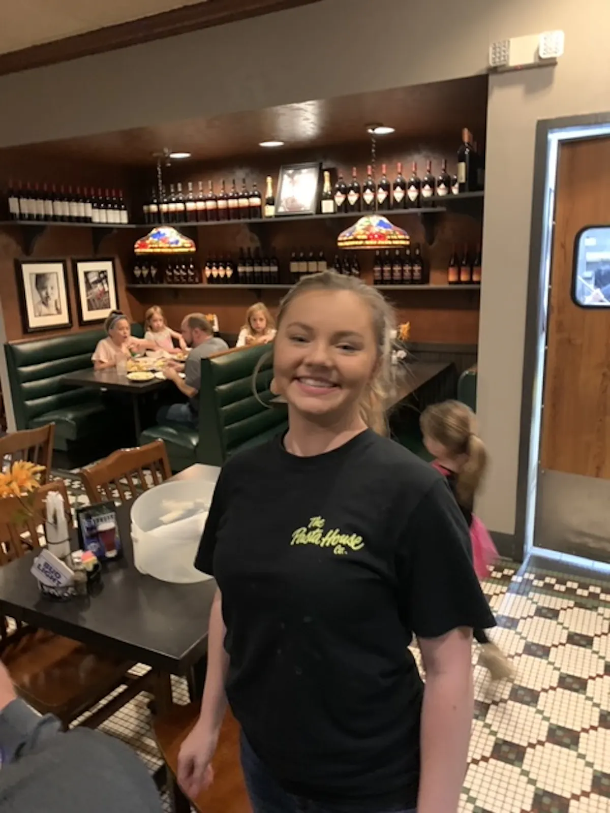 a girl smiling at the camera