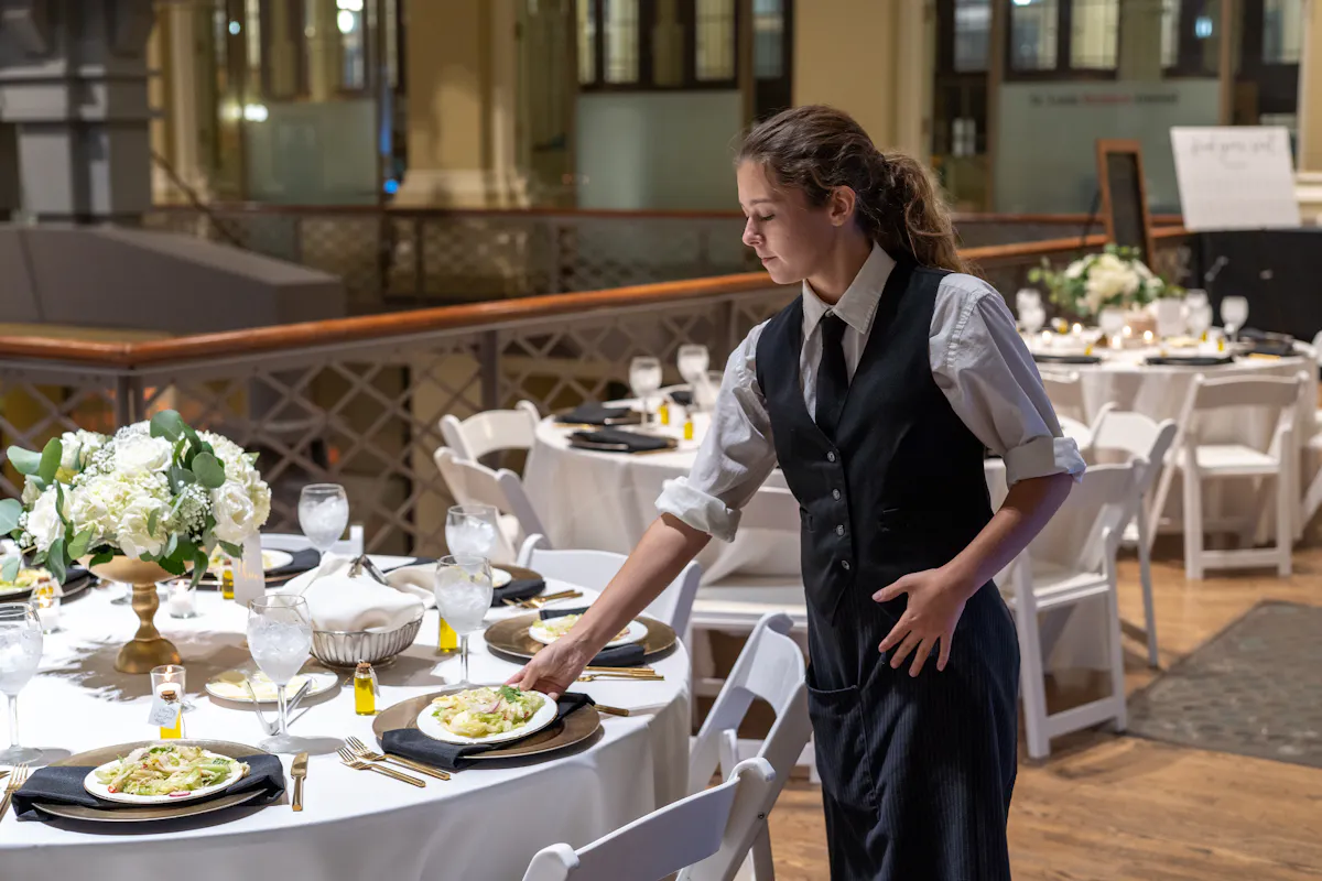 a person preparing food on a table