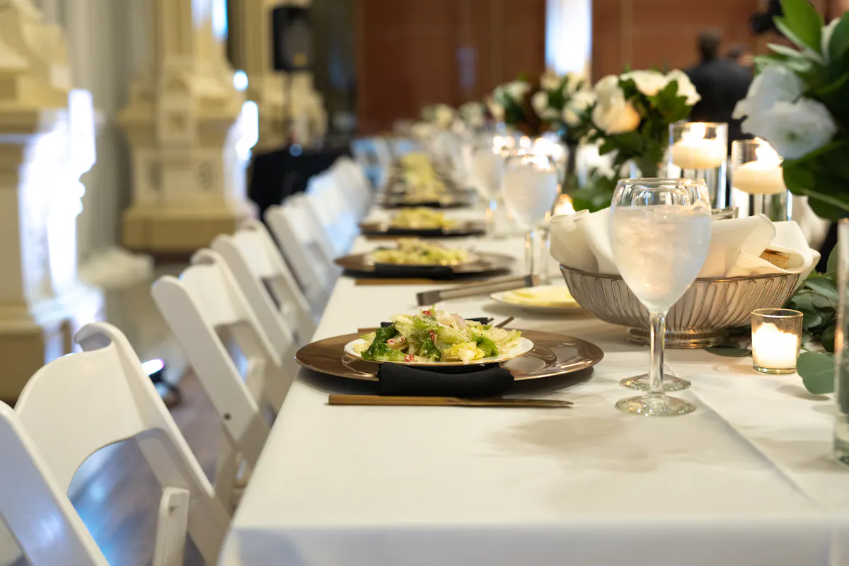 a dining table filled with wine glasses