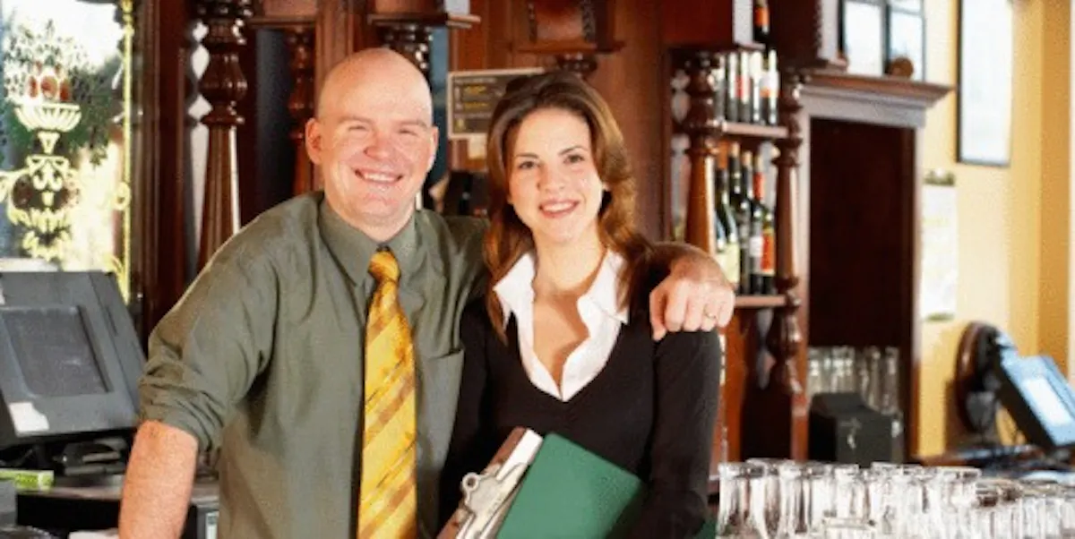 two people posing for the camera