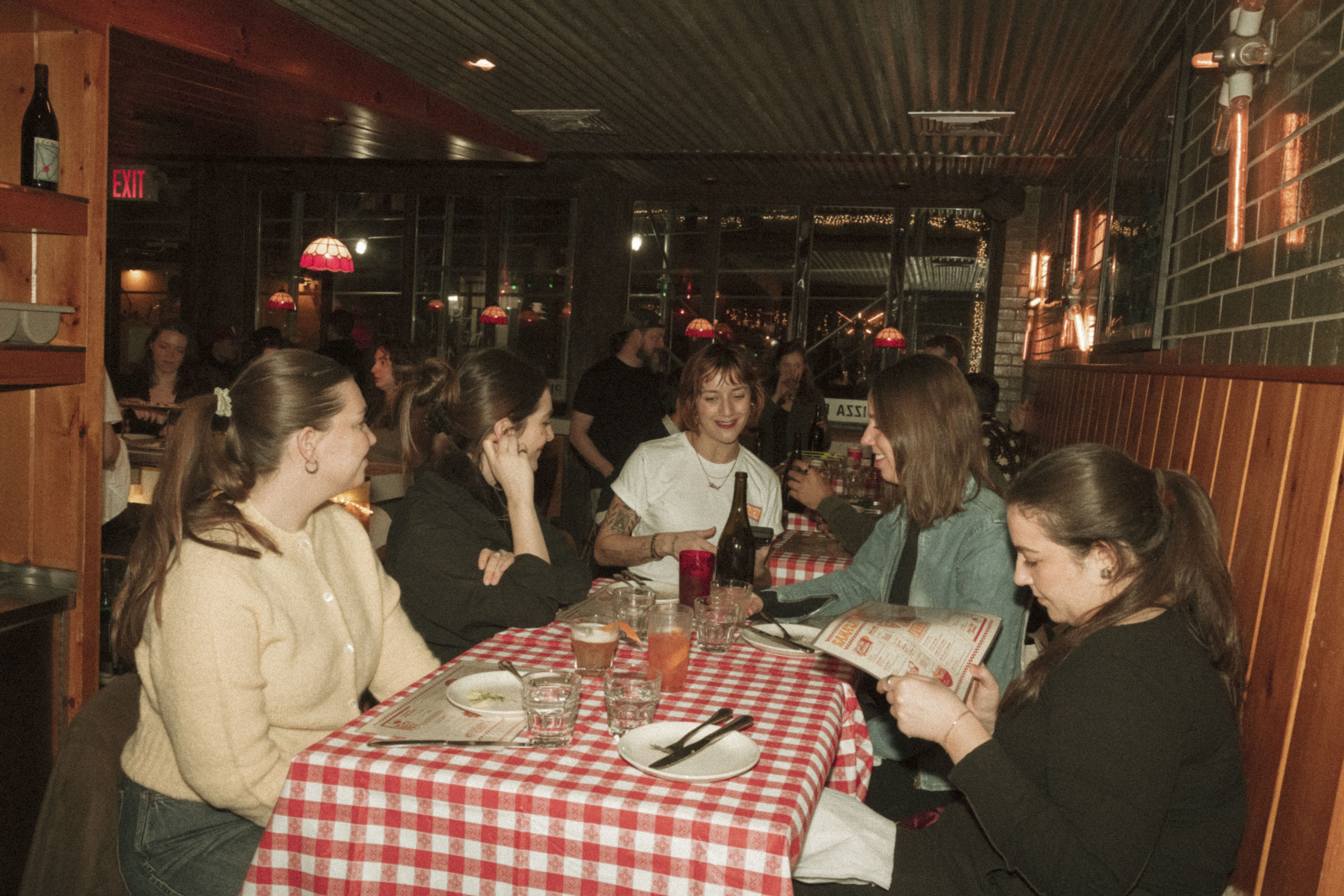 a group of women sitting at a table