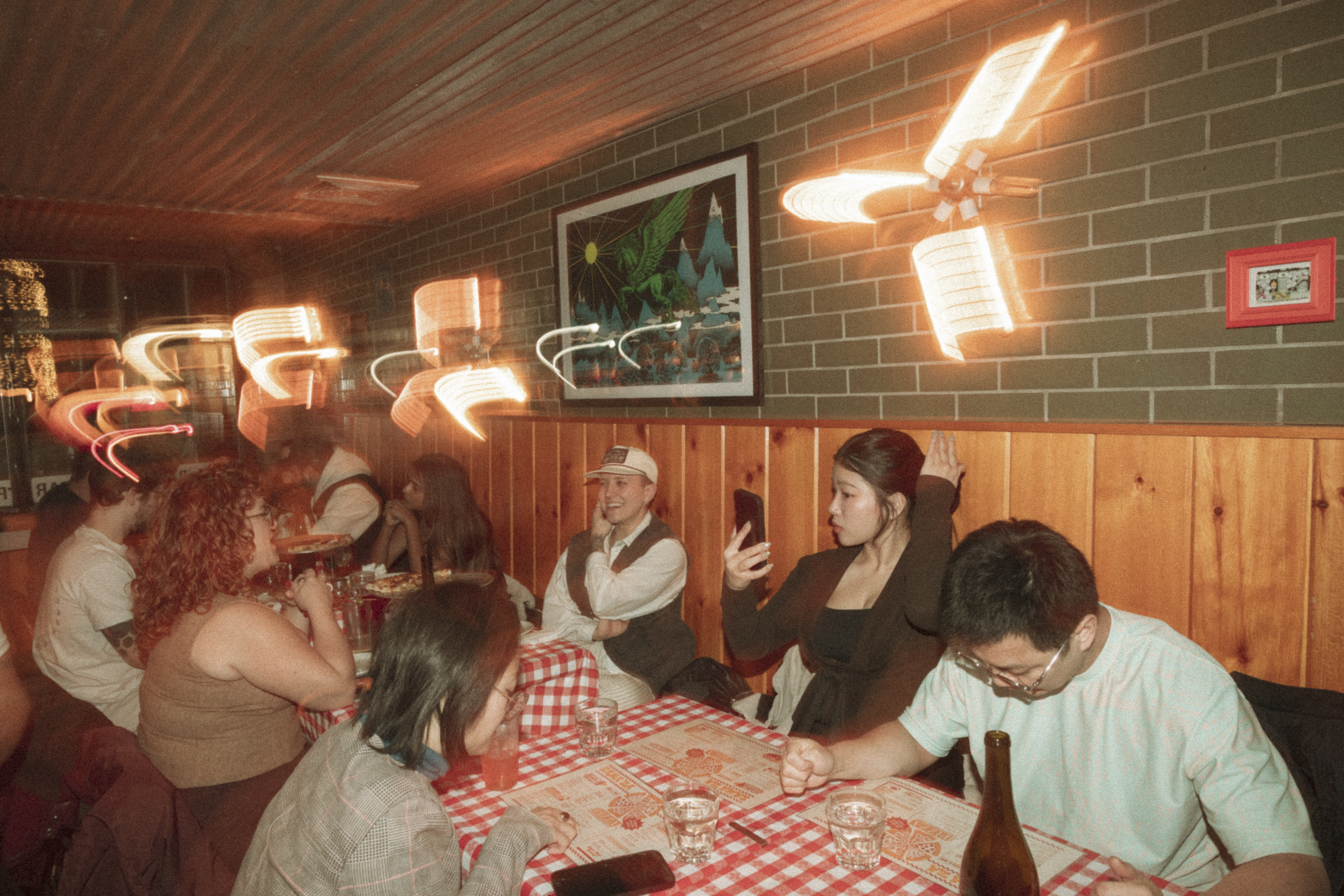 a group of people sitting at a table