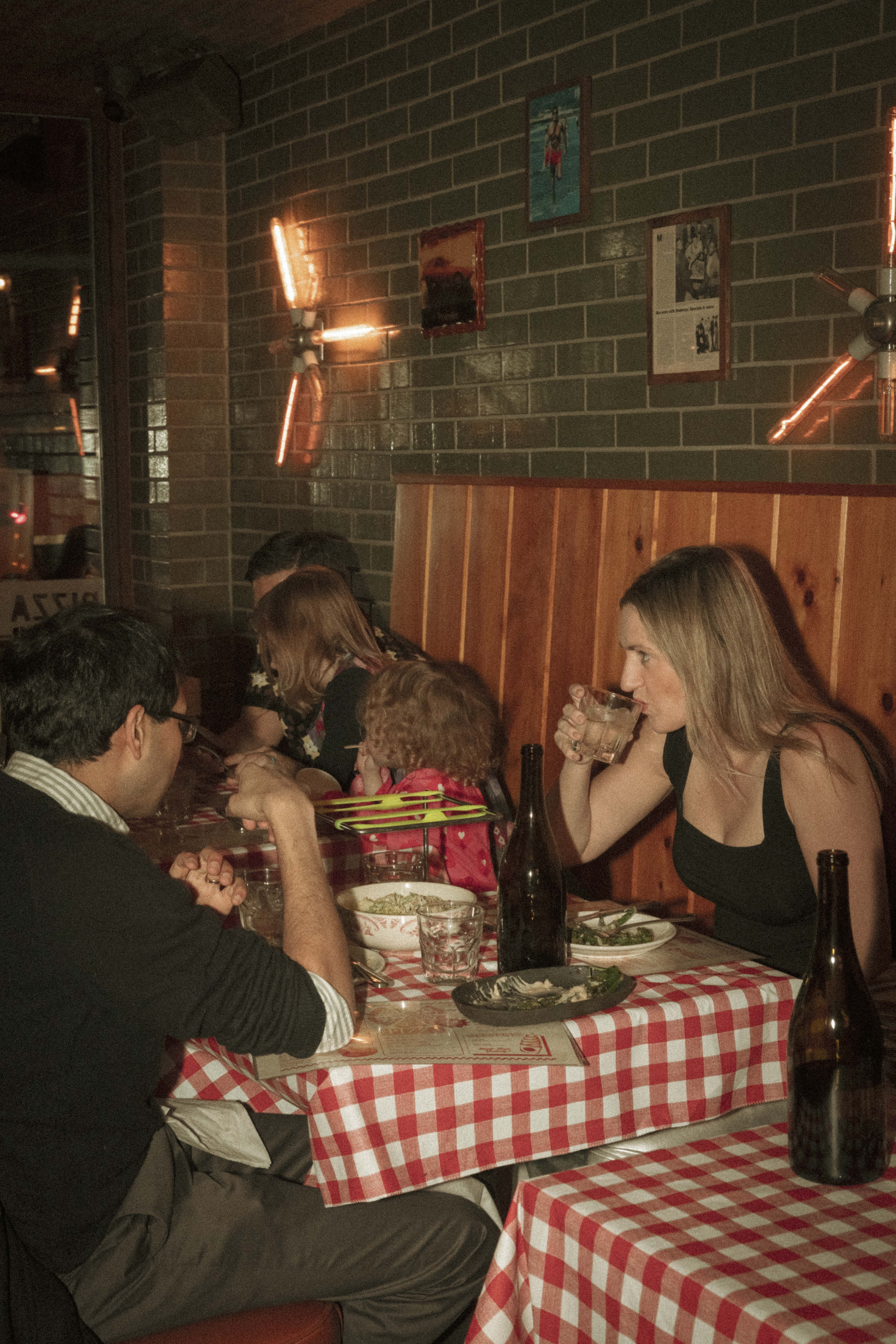 a group of people sitting at a table