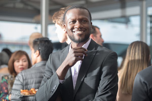 a man wearing a suit and tie