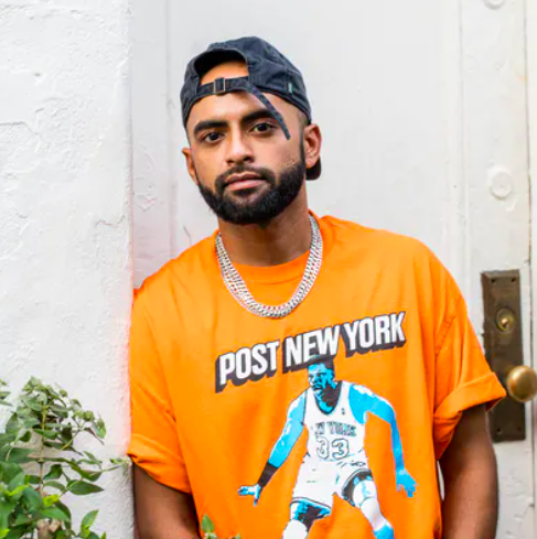 a man in orange shirt