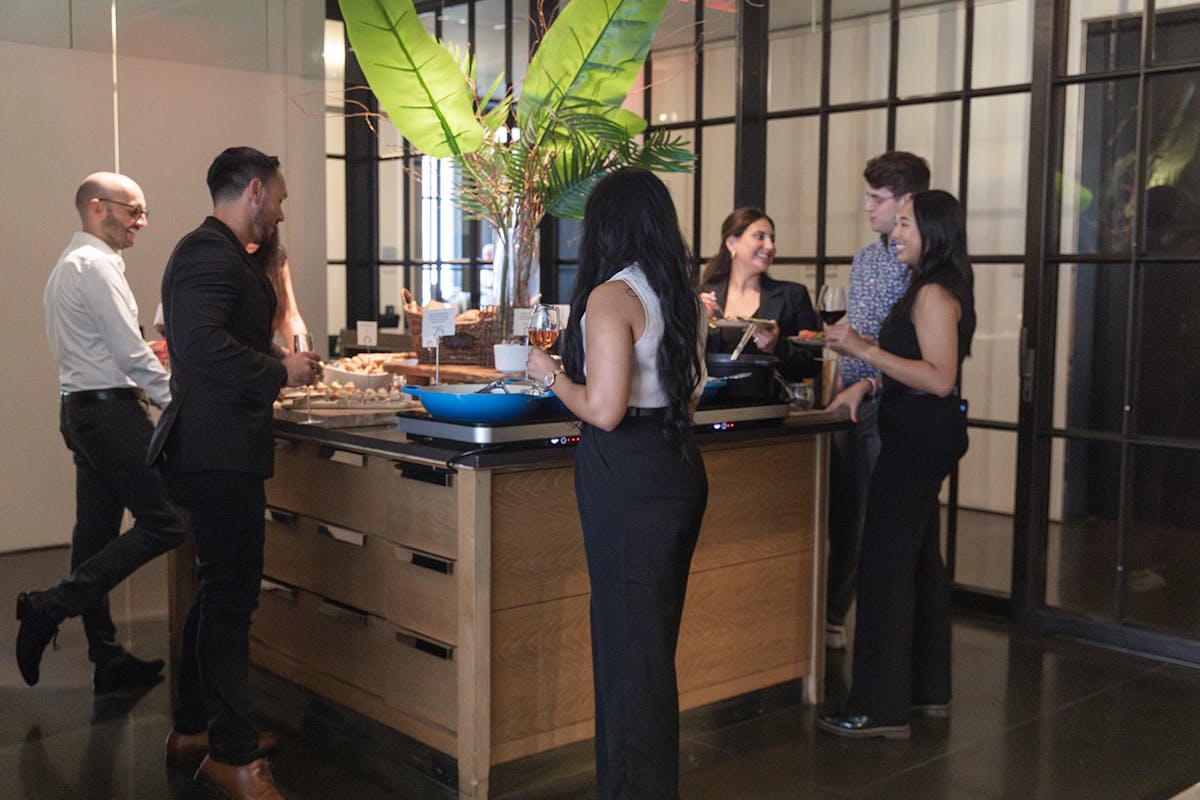 a group of people standing in a room