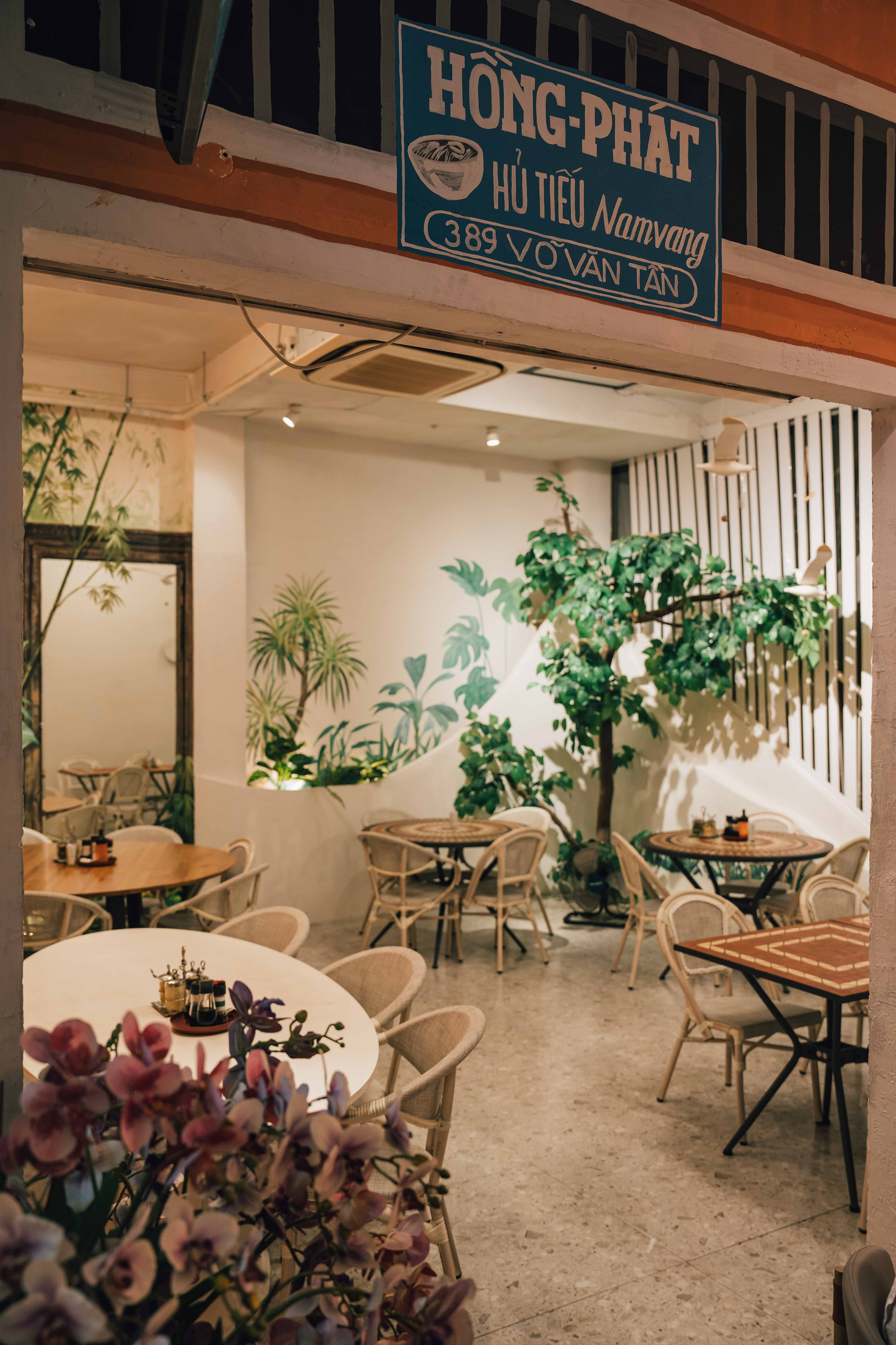 a room filled with furniture and a large window