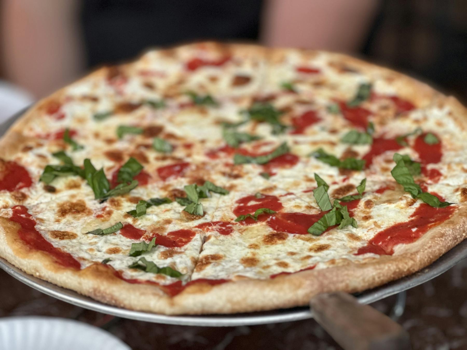 a pizza sitting on top of a table