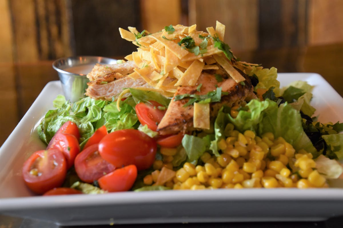 salad with nacho chips