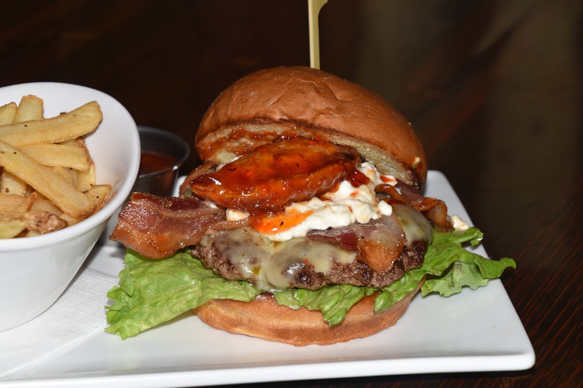 a sandwich sitting on top of a plate of food