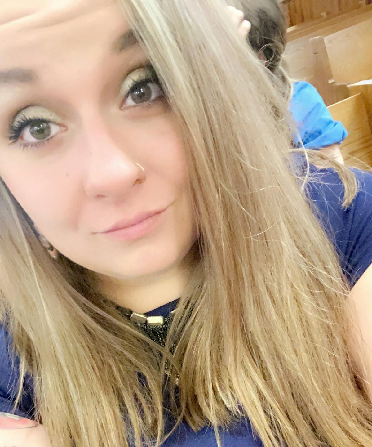 a woman taking a selfie