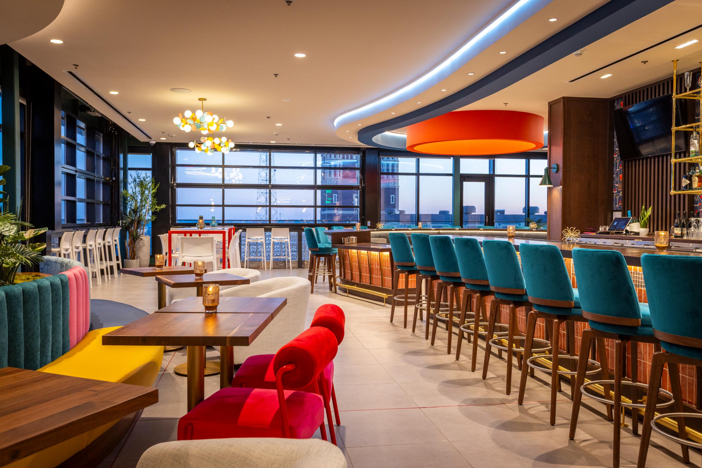 a room filled with furniture and a pool table