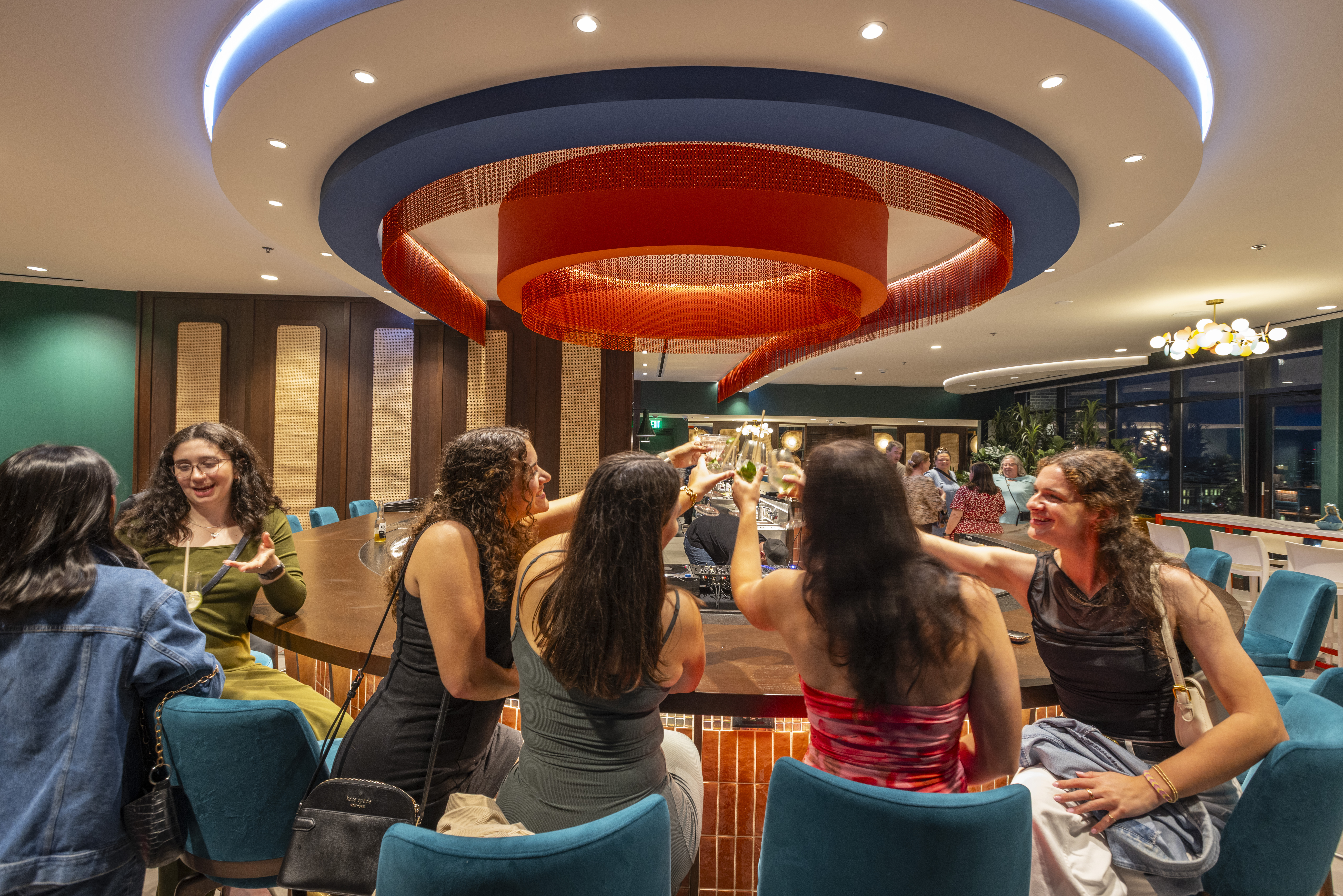 a group of people sitting at a table