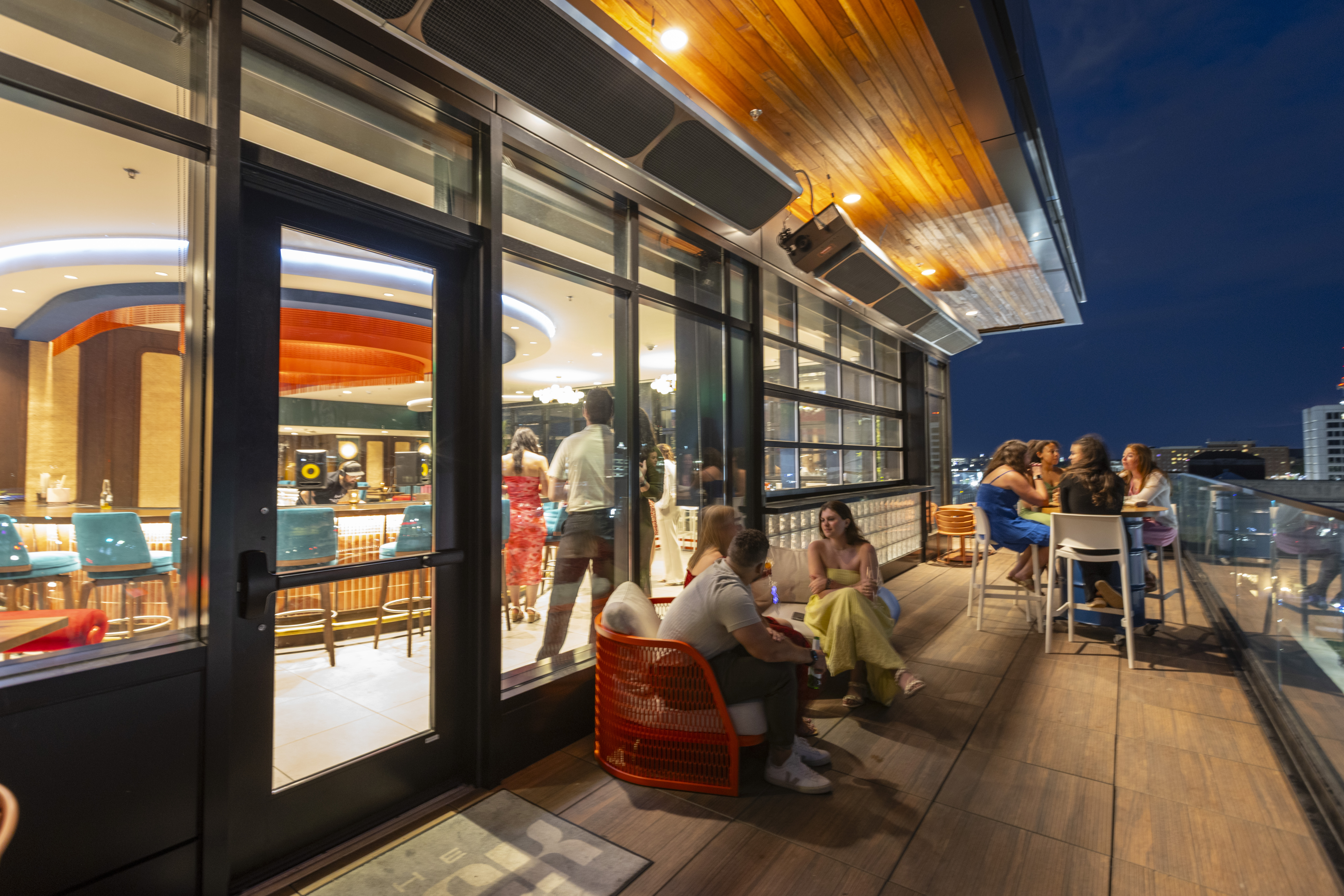 a group of people sitting at a table