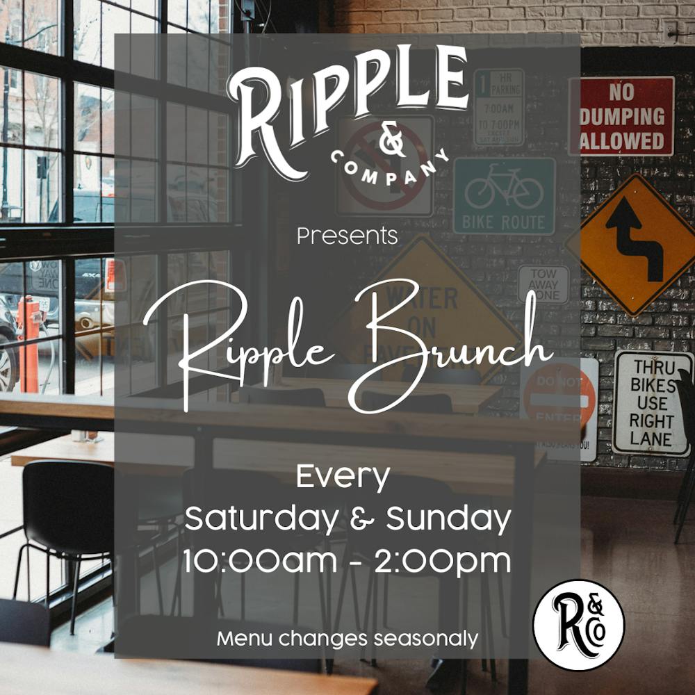 a store sign hanging off the side of a building