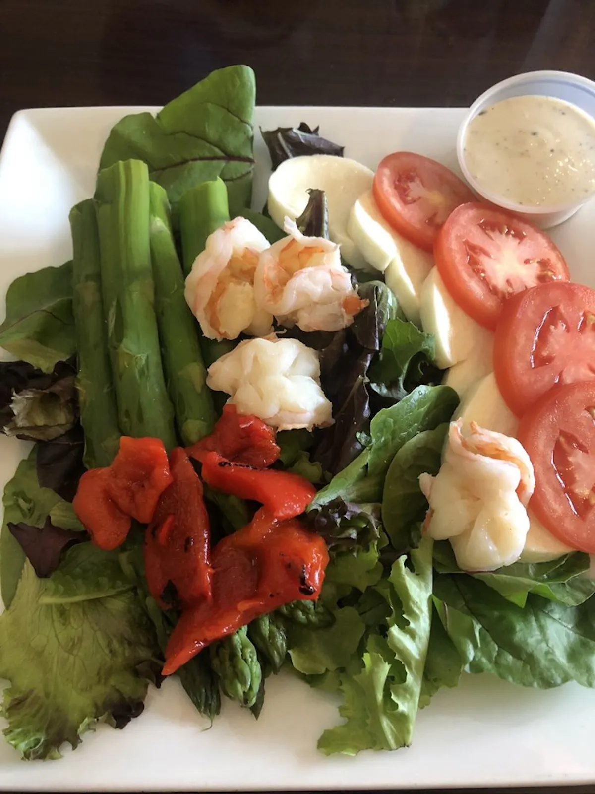 a plate of food with meat and vegetables