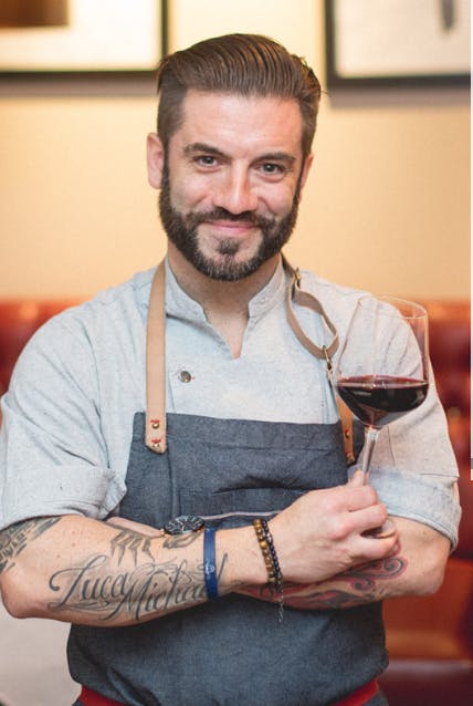 a man smiling for the camera