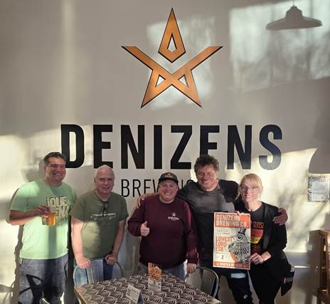 A group of people posing for a photo

AI-generated content may be incorrect.