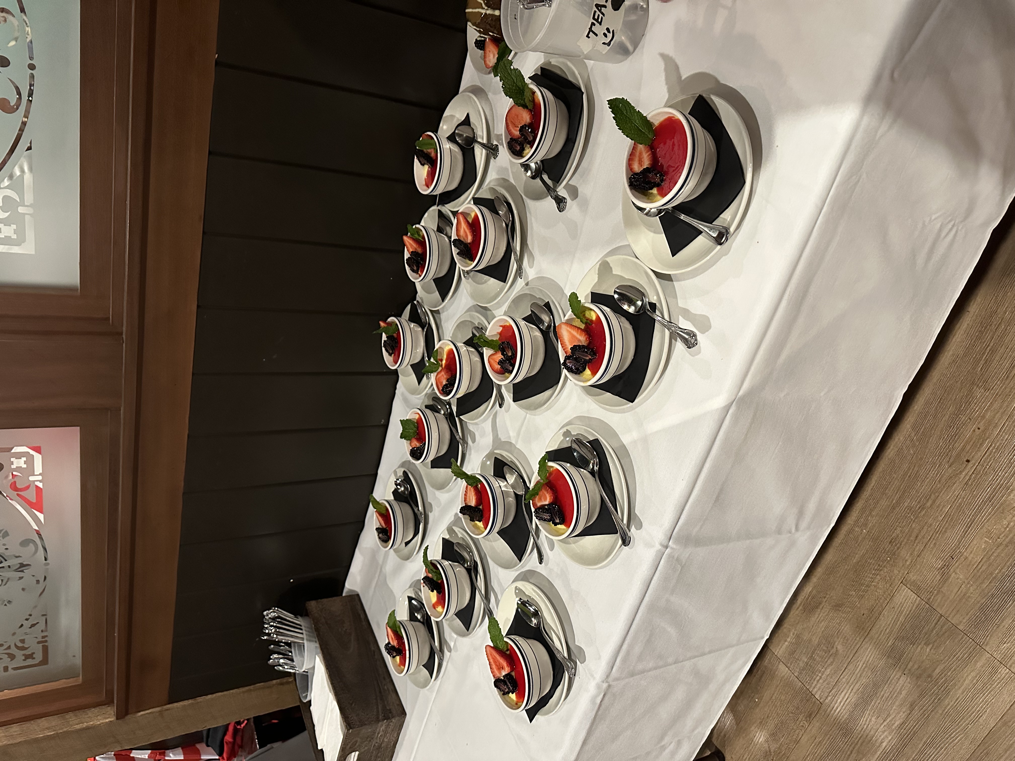 a table topped with plates and glasses