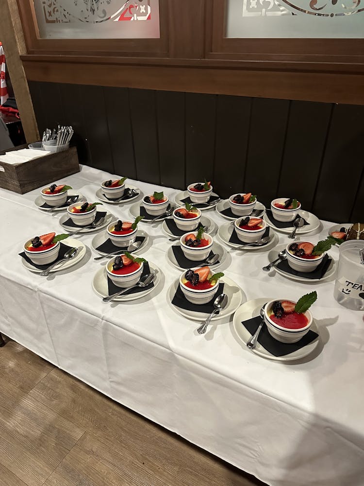 a table topped with plates and glasses