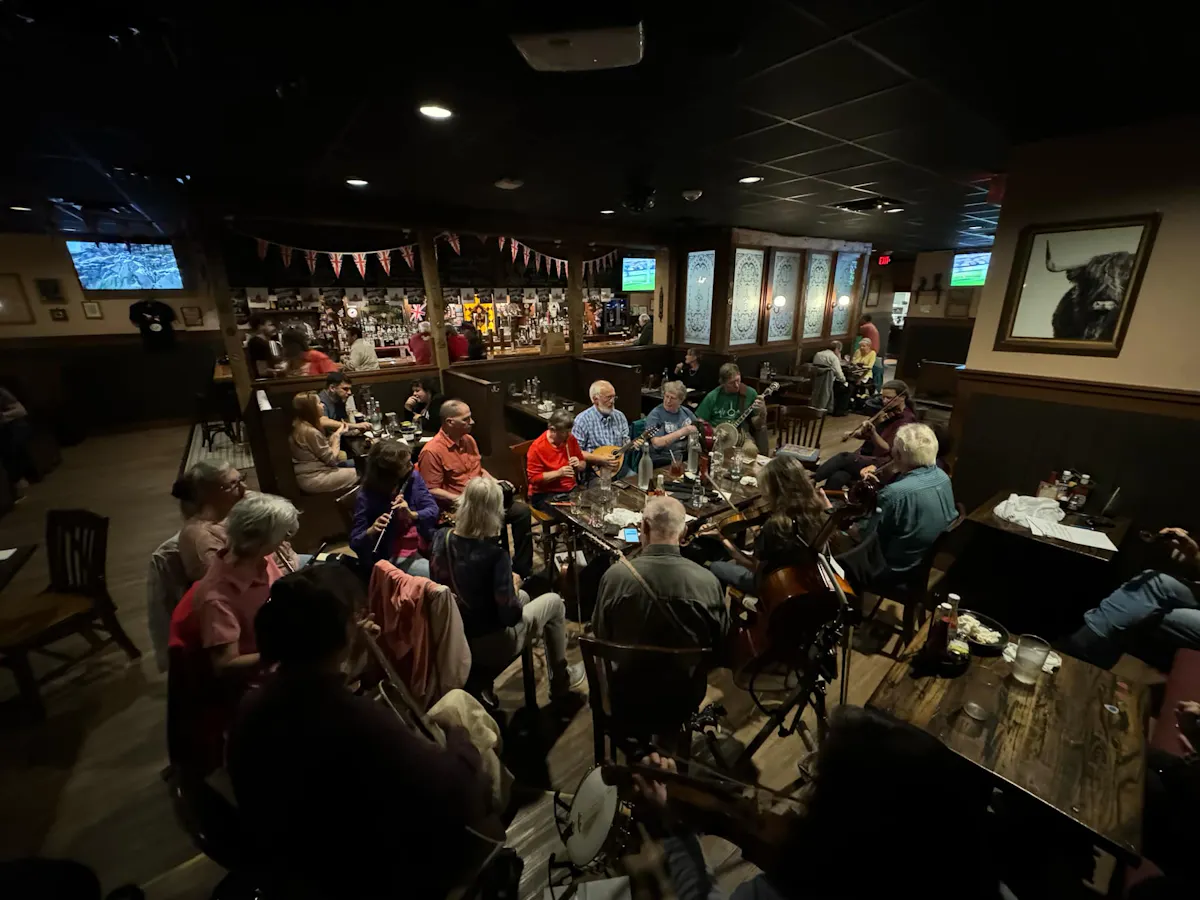 a crowd of people in a room