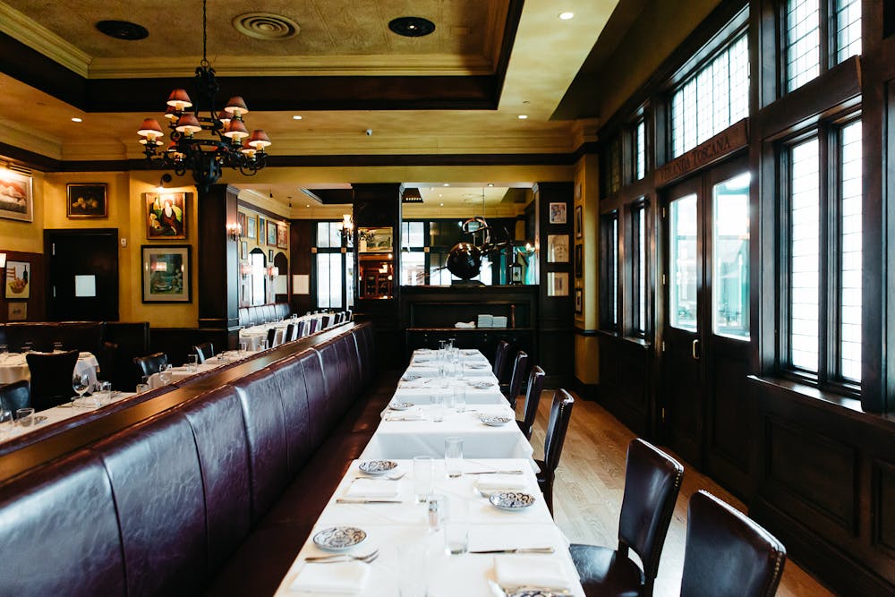 a room filled with furniture and a large window